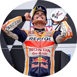 Marc Marquez at the MotoGP Championship, celebrating his victory.